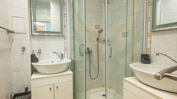 Shower, towels, soap, shampoo