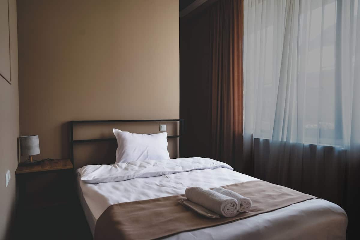 Basic Single Room, Non Smoking, Private Bathroom | Free WiFi, bed sheets