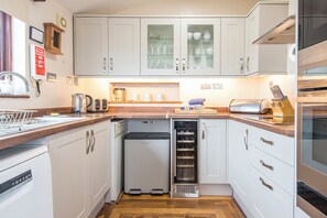 Microwave, dishwasher, toaster, cookware/dishes/utensils