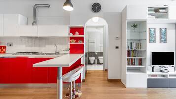 Apartamento urbano | Área de estar | TV de plasma 32 polegadas com canais digitais