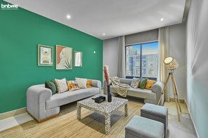 Apartment | Living area | 42-inch LED TV with cable channels, Netflix, streaming services - bnbmehomes-3BR nr Riyadh Park & KAFD-F6 (Riyadh)