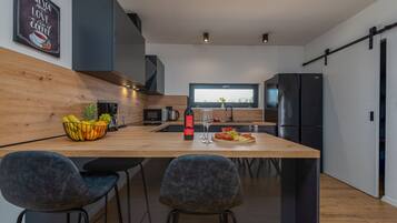 Microwave, dishwasher, coffee/tea maker, highchair