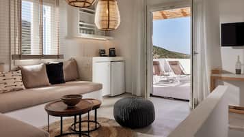 Family Suite With Sea View | Living area | 45-inch Smart TV with digital channels