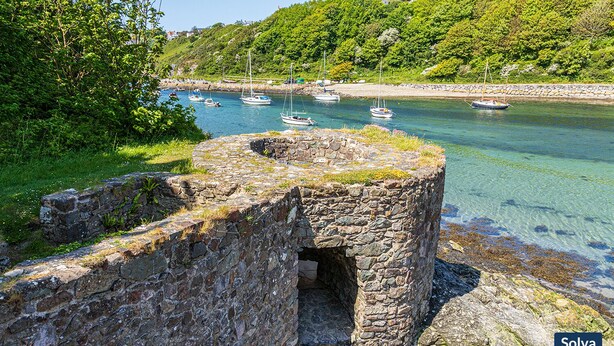 A stone structure with a clear view of a harbor with boats. - Alma Cottage, Holiday Cottage Solva, Sleeps 3, 2 bedrooms,  bathrooms (Haverfordwest)