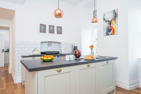 Microwave, dishwasher, toaster, cookware/dishes/utensils