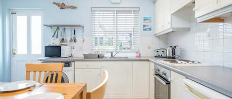 Microwave, toaster, cookware/dishes/utensils