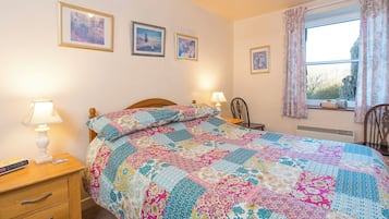 1 soverom og strykejern/-brett