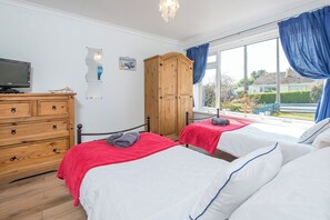 2 habitaciones, tabla de planchar con plancha y internet 