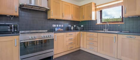 Microwave, dishwasher, toaster, cookware/dishes/utensils