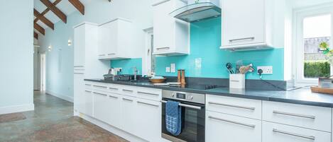 Microwave, dishwasher, toaster, cookware/dishes/utensils