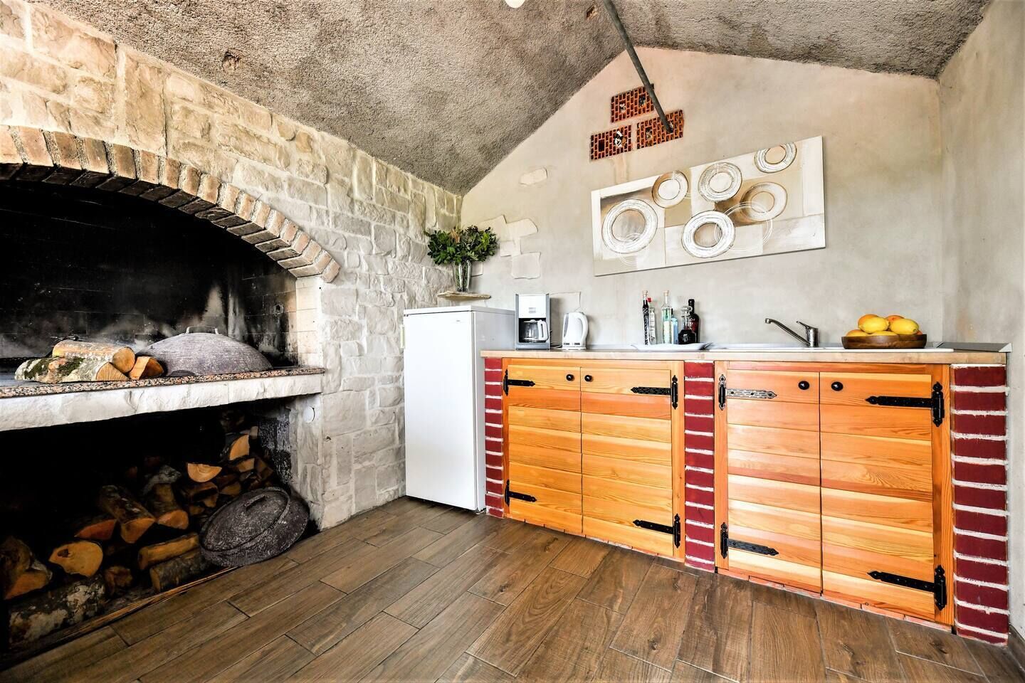 Summer kitchen with bbq by the pool.
