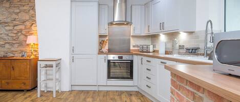 Microwave, dishwasher, toaster, cookware/dishes/utensils