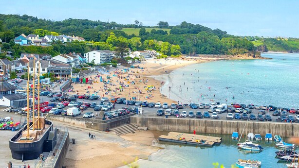 A coastal town with a sandy beach, parked cars, and boats near the water. - The Rath Cottage, Holiday Cottage Saundersfoot, Sleeps 2, 1 bedrooms,  bathrooms (SAUNDERSFOOT)