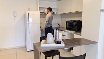 Standard Apartment | Private kitchen | Full-size fridge, oven, electric kettle, toaster