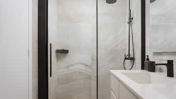Exclusive Apartment | Bathroom | Shower, rainfall showerhead, free toiletries, hair dryer