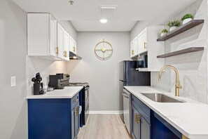 Appartement | Cuisine privée | Réfrigérateur, plaque de cuisson