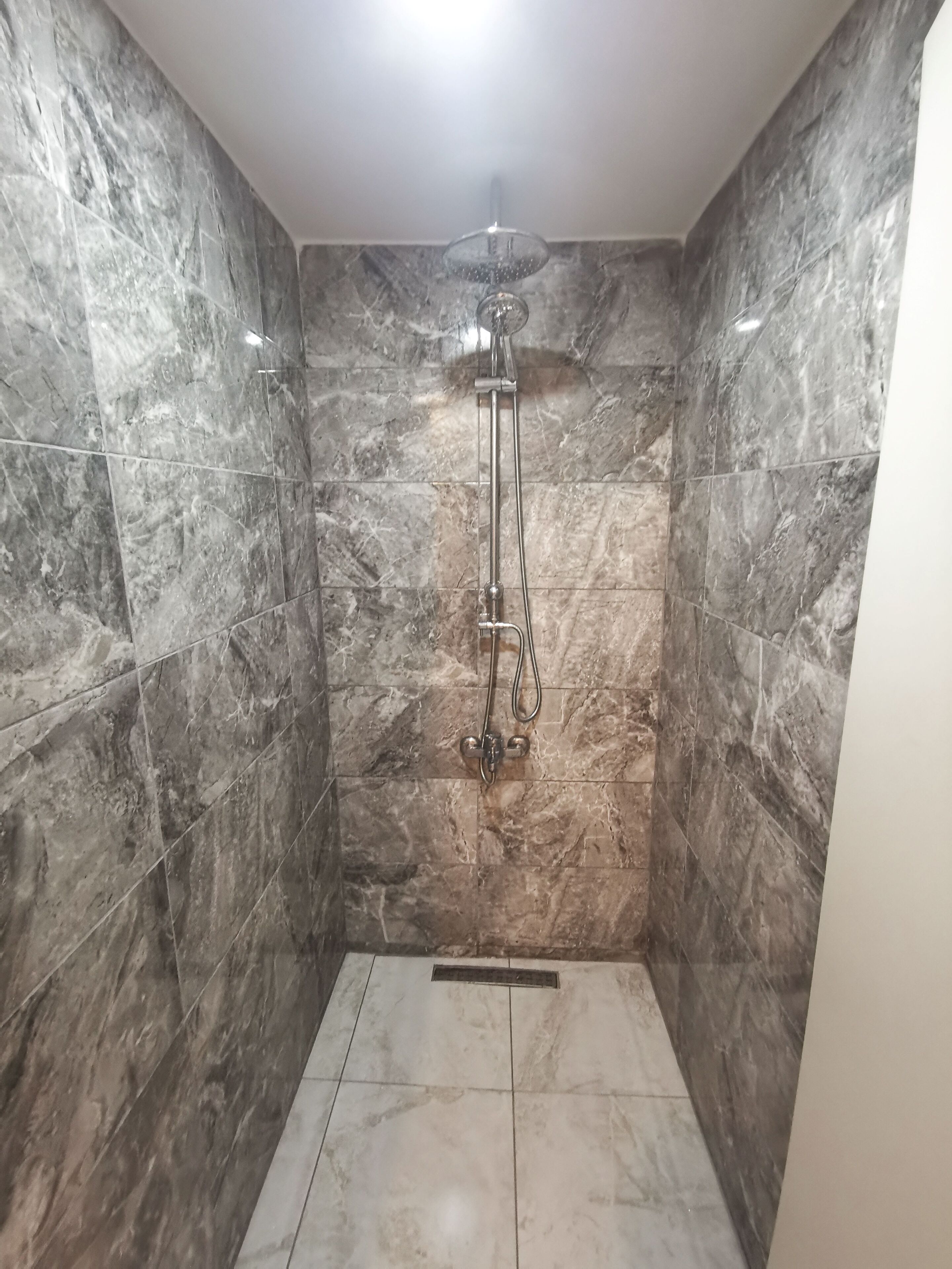 Rainfall showerhead, hair dryer, towels, soap