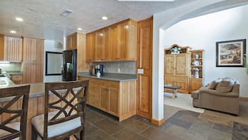 Chalet, 4 Bedrooms | Private kitchen | Fridge, oven, coffee/tea maker, toaster