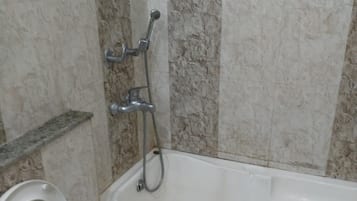 Deluxe Double Room | Bathroom | Shower, rainfall showerhead, towels, soap