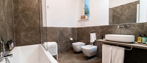 Hair dryer, bidet, towels, soap
