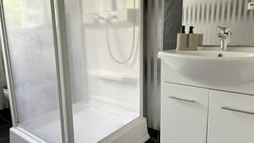 Hair dryer, towels, soap, shampoo