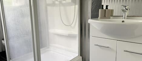 Hair dryer, towels, soap, shampoo