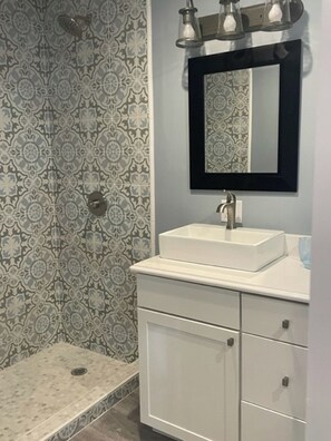 Hair dryer, towels, soap, shampoo