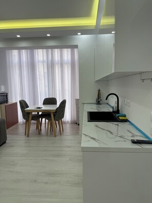 Comfort Quadruple Room | Living area - KOA Hotel Tiranë (Tirana)