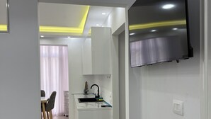 Comfort Quadruple Room | Living area