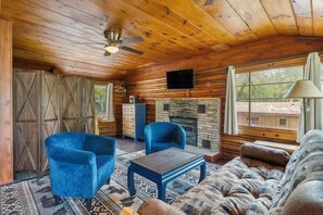 TV, fireplace - Reed's on the River Cabin 8 (Indian River)