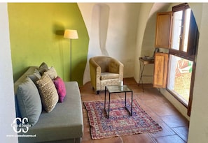 Suite superior, vistas al lago | Zona de estar