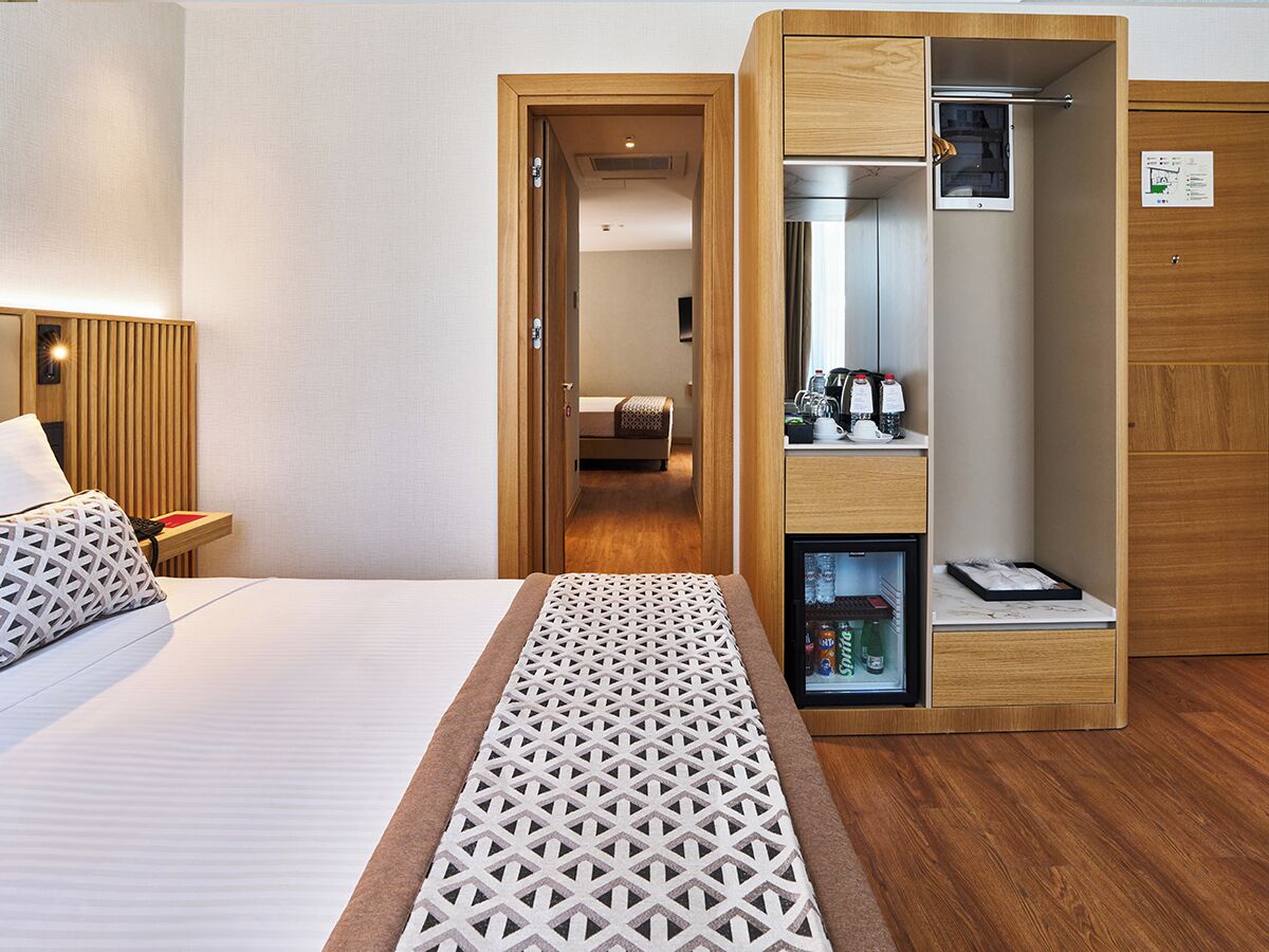 Habitación familiar, habitaciones comunicadas | Minibar, caja fuerte, sistema de insonorización