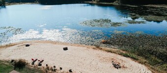 Waterfront Lake Cottage w/ Private Beach - Kayak at the Hemingway Lodge!