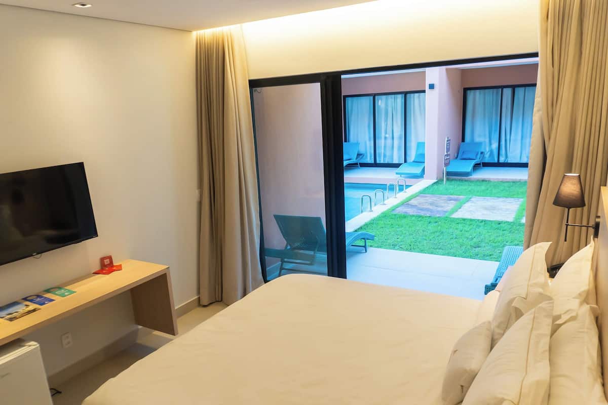 ห้องดีลักซ์สวีท, วิวสวน | มินิบาร์, Wi-Fi ฟรี, ผ้าปูที่นอน