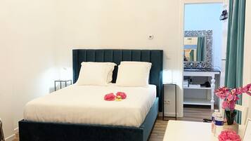 1 slaapkamer, een minibar met enkele gratis items