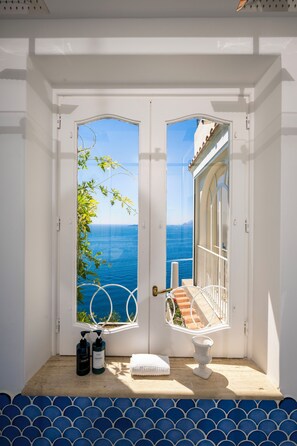 Royal Suite, 1 Bedroom, Sea View | Bathroom | Rainfall showerhead, hair dryer, bathrobes, slippers