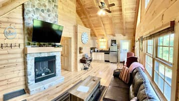 Smart TV, fireplace, DVD player, books