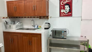 Fridge, microwave, electric kettle, toaster
