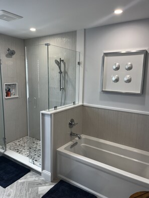 Shower, hair dryer, towels, soap