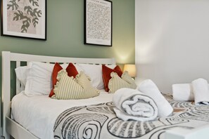 2 dormitorios, tabla de planchar con plancha, wifi gratis y ropa de cama