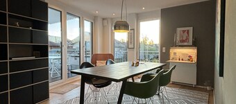 Modern 106 sqm luxury apartment with roof terrace and mountain views of the Alps