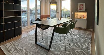 Modern 106 sqm luxury apartment with roof terrace and mountain views of the Alps