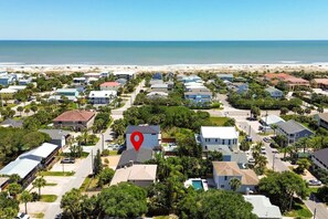 A coastal residential area with houses, a beach, and a red location marker. - Silver Palms - Holiday in Style: Beach + Pool! (St. Augustine Beach)