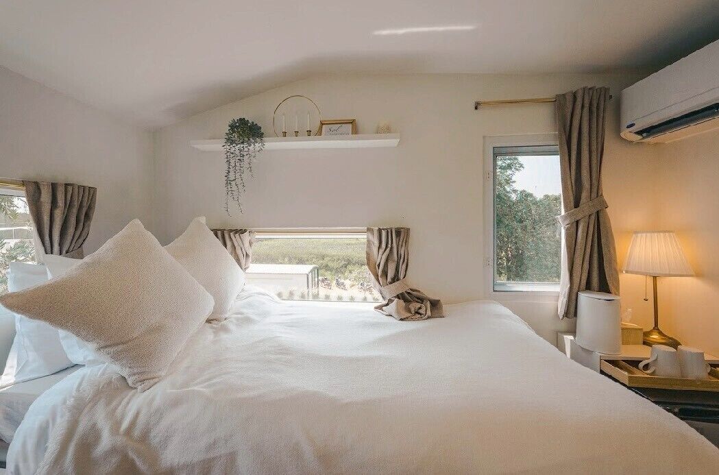 Cabaña superior, se aceptan mascotas, vista al jardín | Wifi gratis y ropa de cama 