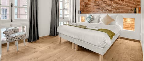 2 slaapkamers, een strijkplank/strijkijzer, gratis wifi, beddengoed