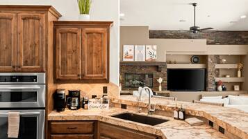 Coffee/tea maker, fridge, microwave, oven