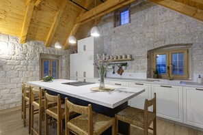 Oven, stovetop, dishwasher, dining tables