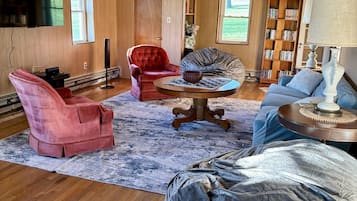 Smart TV, DVD player, foosball, books