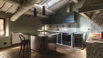 Deluxe Apartment, 2 Bedrooms | Private kitchen | Full-size fridge, oven, stovetop, dishwasher