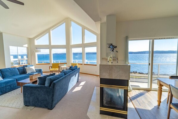 TV, fireplace - Waterfront home w/ beach access and Game room (Port Ludlow)